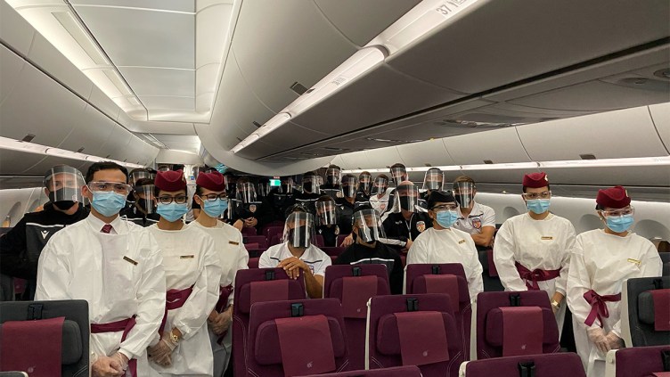 Glory players and Qatar Airway cabin crew