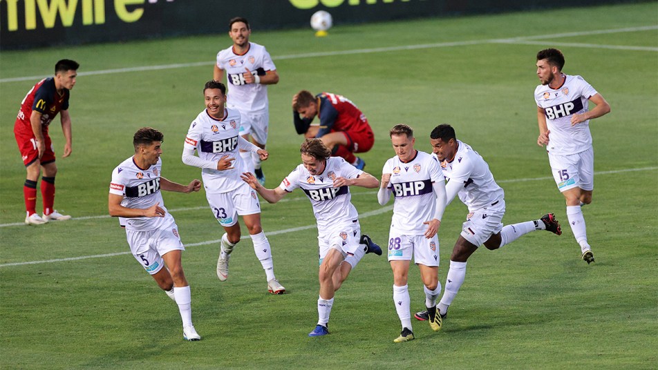 Adelaide United v Glory 2021 - Daniel Stynes and players celebrate