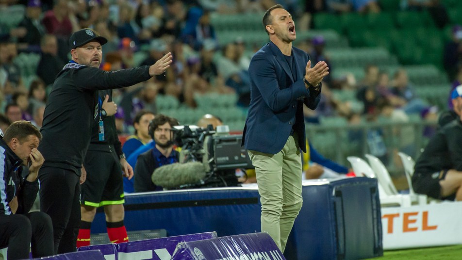 Richard Garcia and Steven McGarry on the A-League bench